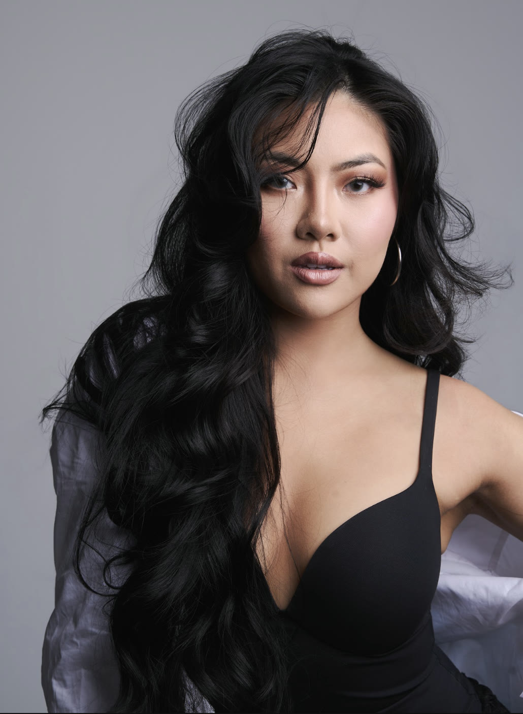 Vivian True in a black top, studio portrait with soft lighting